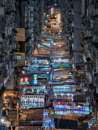 High angle view of illuminated buildings at night