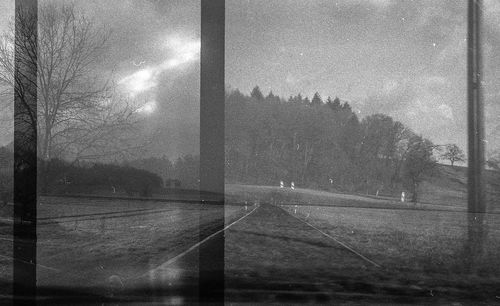 Road seen through glass window