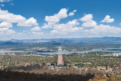 Aerial view of canberra australian capital city with griffin lake and suburbs.
