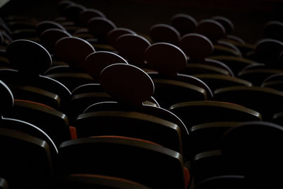 Close-up of chairs in row