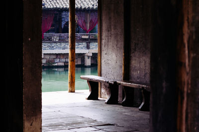 Wooden posts in water