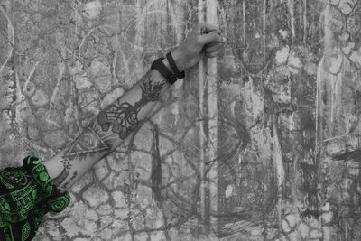 Low section of man against trees