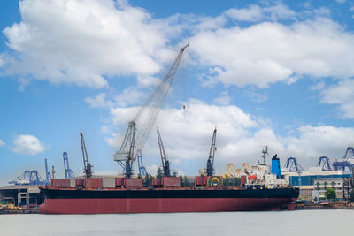 Cranes at the famous shipyard repiaring,maintenance, ship on the sea thailand