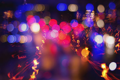 Defocused image of illuminated christmas lights