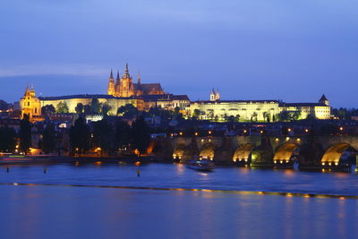 Illuminated buildings at waterfront