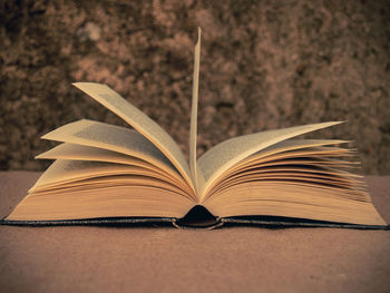 Close-up of open book on table