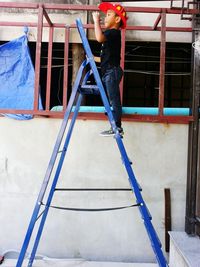 Low angle view of man at construction site