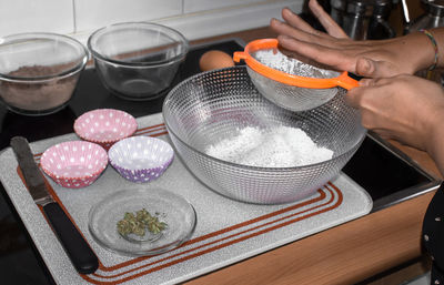 High angle view of person preparing food on table