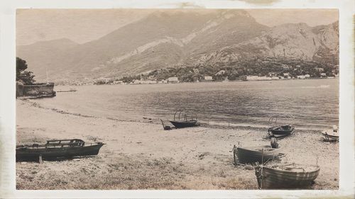 Boats moored in bay