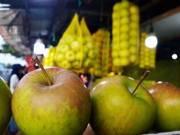 Close-up of apples for sale at market stall