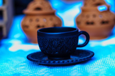 Close-up of antique cup for sale at market