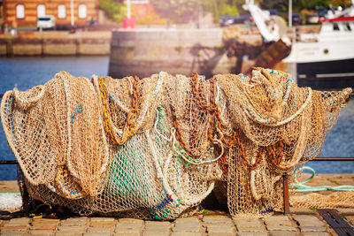 Fishing net on boat at harbor