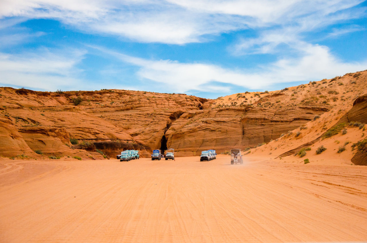 CAR ON DESERT LAND