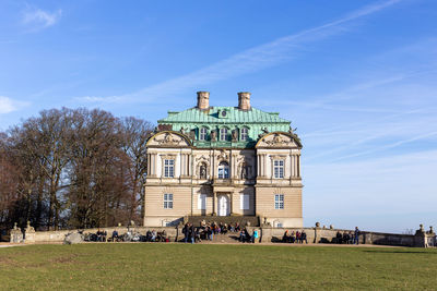 Group of people in front of building