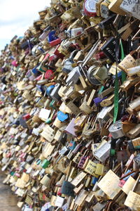 Close-up of padlocks hanging on metal