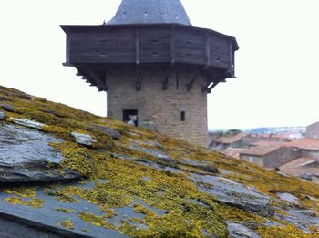 View of tower on cliff against clear sky