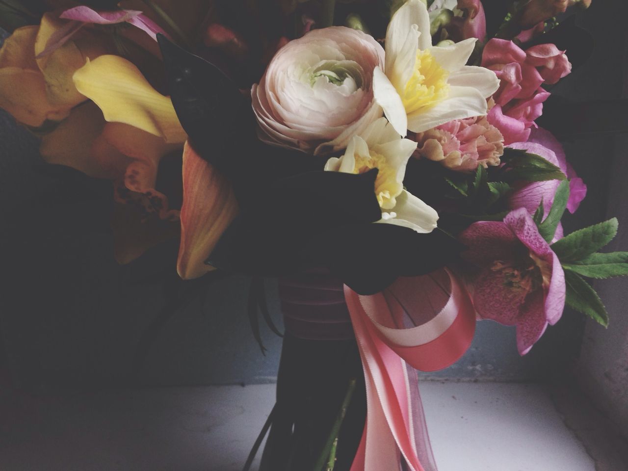 indoors, flower, petal, multi colored, close-up, home interior, pink color, decoration, flower head, fragility, vase, animal representation, no people, freshness, bouquet, art and craft, art, high angle view, creativity, toy