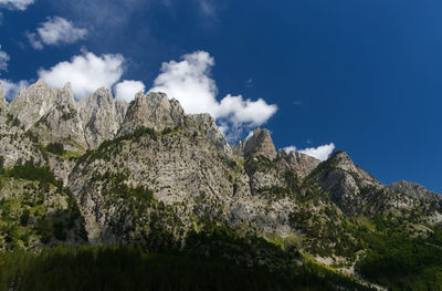 Low angle view of rocks against sky