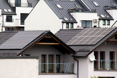 Installing a solar cell on a roof.