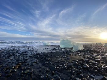 Scenic view of sea against sky during winter