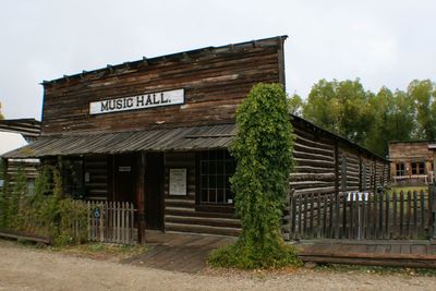 Built structure with trees in foreground