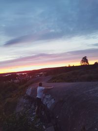 Scenic view of landscape against sky during sunset