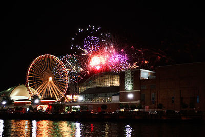 Fireworks exploding in night sky