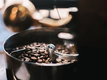 Close-up of roasted coffee beans in container