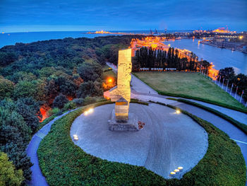 High angle view of illuminated city at dusk