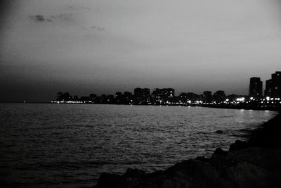 Illuminated cityscape at night