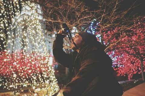 MAN IN CHRISTMAS TREE