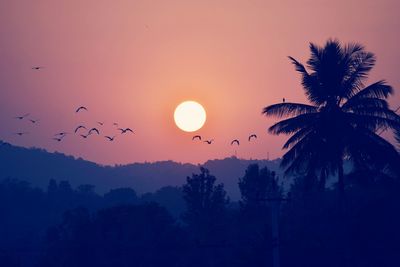 Scenic view of landscape against sky during sunset