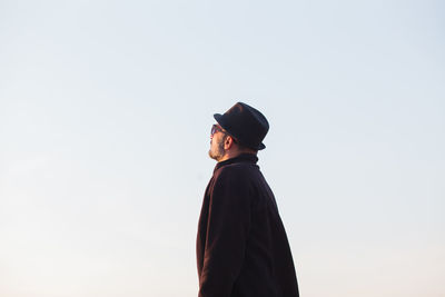 Man standing against clear sky