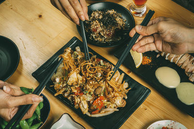 Midsection of man having food