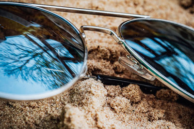 Close-up of sunglasses on table