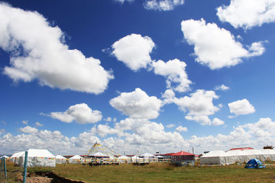 Houses and buildings against sky