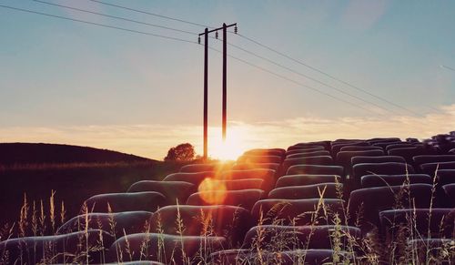 Scenic view of field against sky during sunset