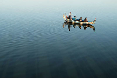 High angle view of people on boat in lake