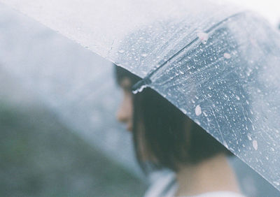 Close-up of wet window during rainy season