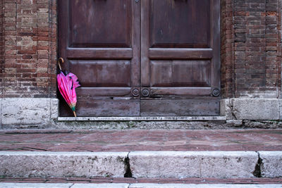 Pink closed door of building