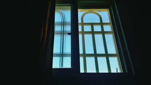 Sunlight falling through window in darkroom