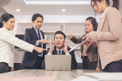 Business colleagues working at office