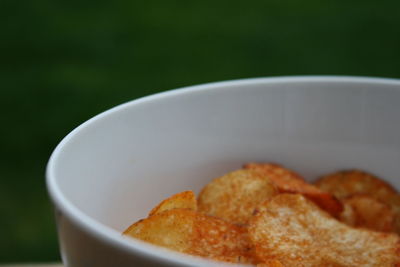 Close-up of potato chips in bowl