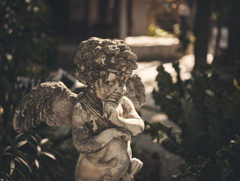 A victorian style garden, with cupid decoration statue. concept valentine day