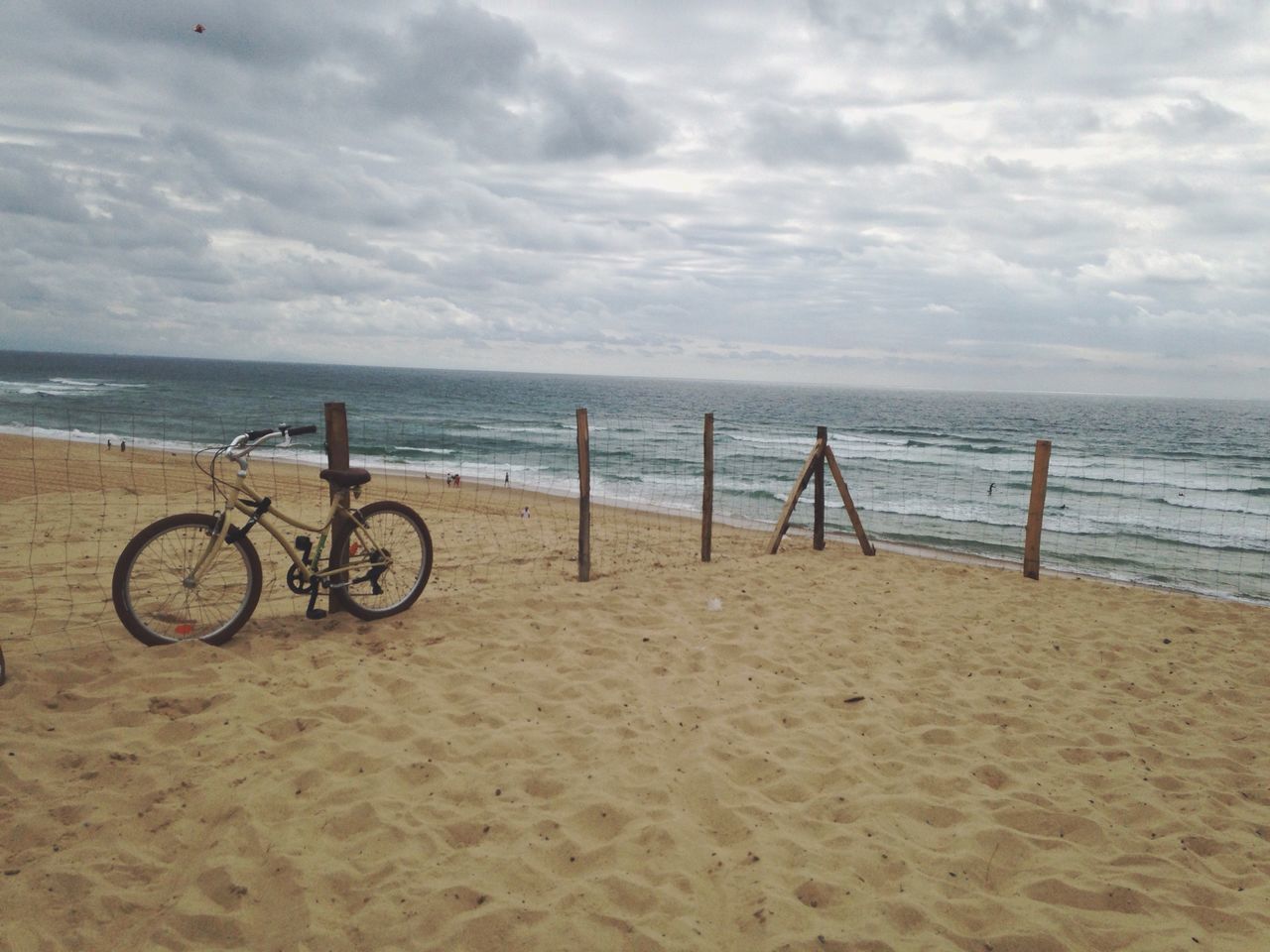 sea, horizon over water, sky, beach, water, cloud - sky, shore, cloudy, tranquility, tranquil scene, scenics, sand, cloud, beauty in nature, nature, bicycle, day, idyllic, pier, outdoors