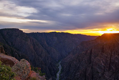 Scenic view of mountains against sky during sunset