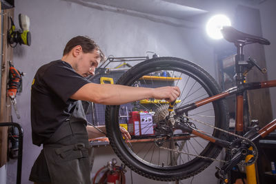 Man working with bicycle