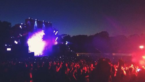 People enjoying music concert