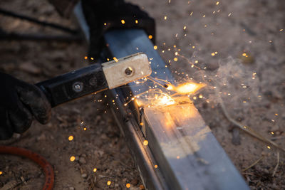 Man working on metal with fire hydrant