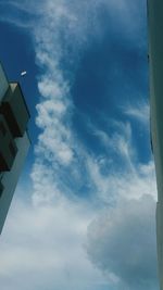 Low angle view of built structure against blue sky